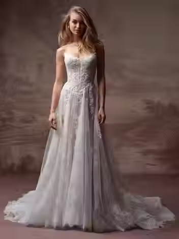 Strapless Maggie Sottero Hadley A-line wedding dress with lace appliqué bodice and tulle skirt — Majesty Bridal, Danbury CT