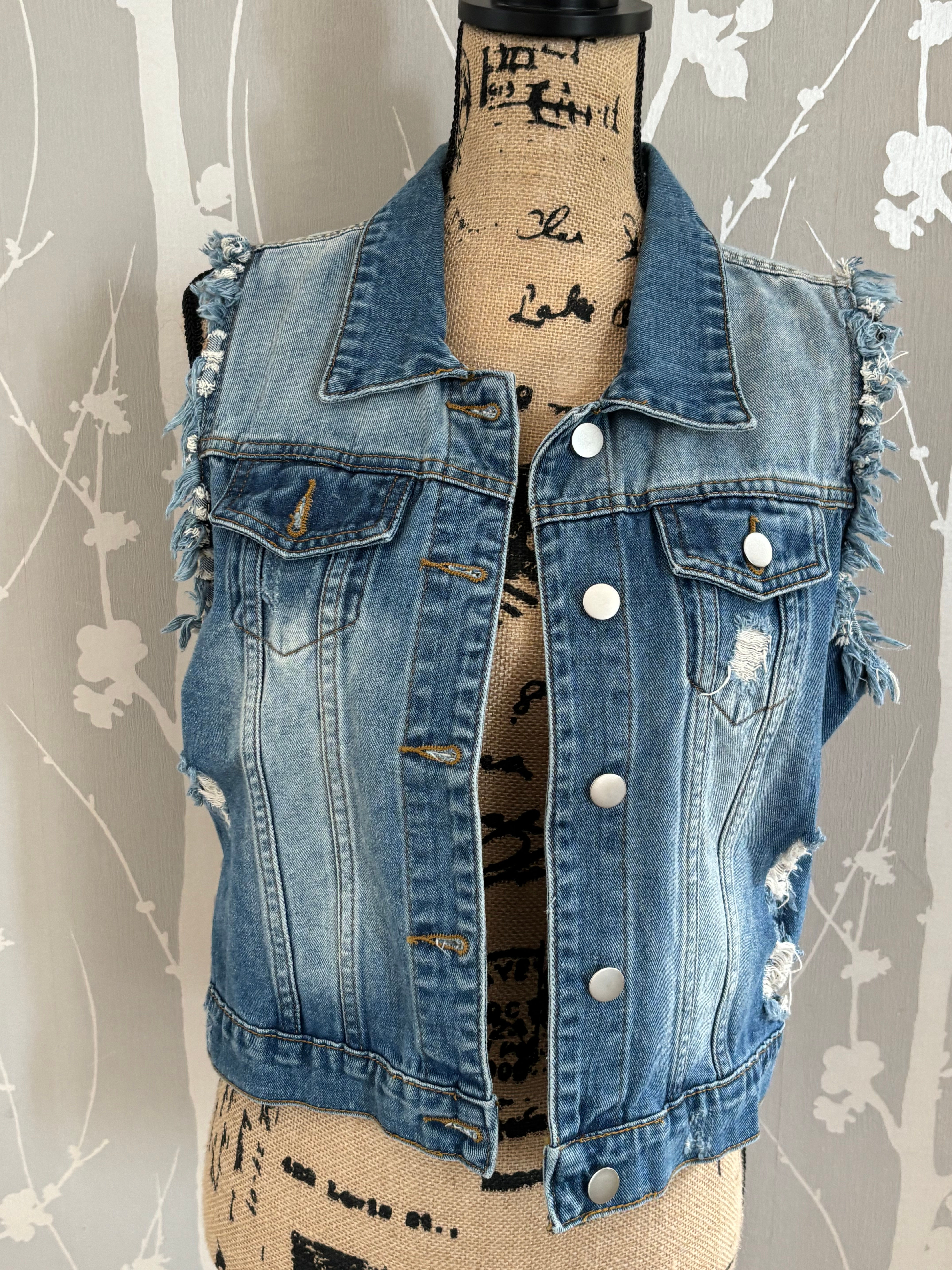 Gilet en jean sans manches effet destroy – Taille S