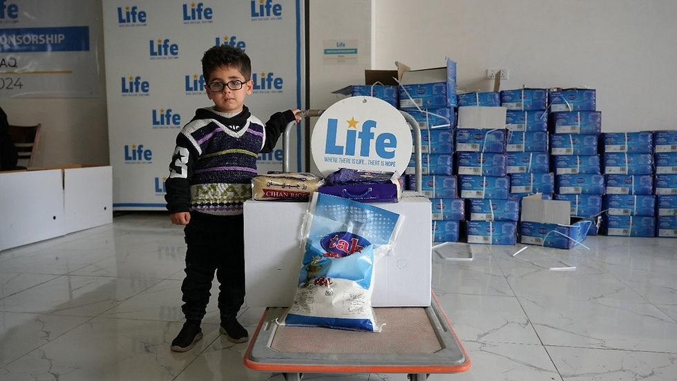 Photo of an orphan and Life for Relief and Development USA (LIFE) support.