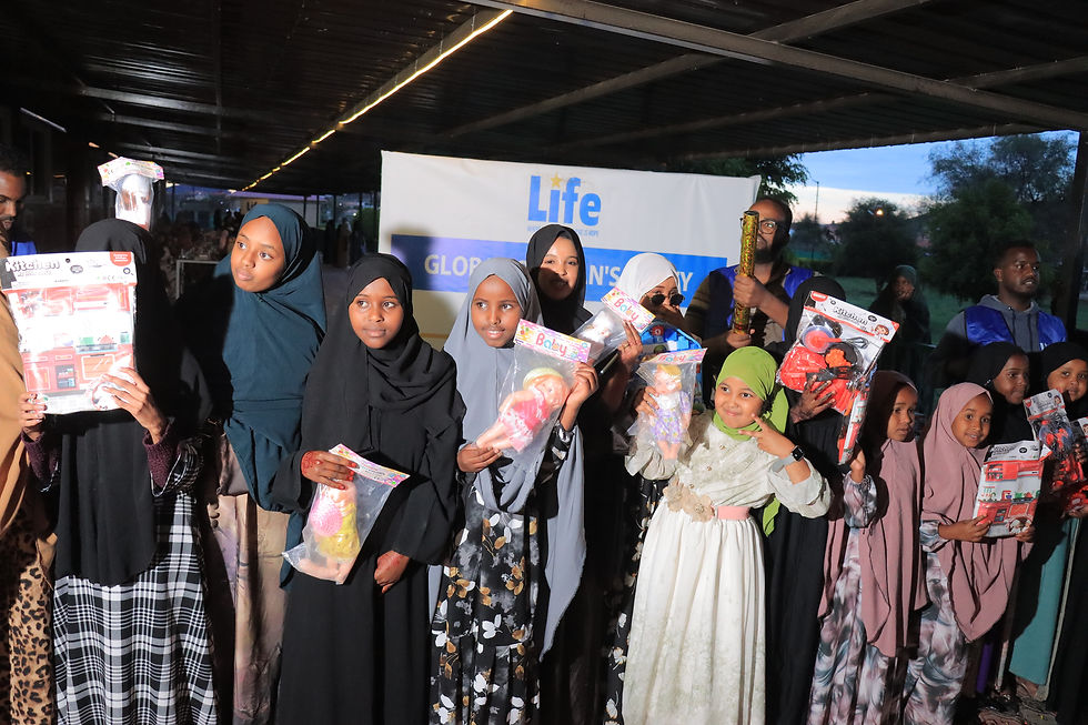 Photo of Life for Relief and Development (LIFE) distributing toys to orphans in Somaliland.