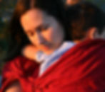 Photo of a mother holding her child.