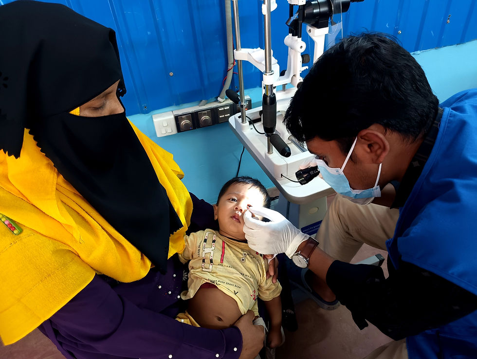 Photo of a baby receiving treatment at the Life for Relief and Development USA (LIFE) eye clinic in Bangladesh.