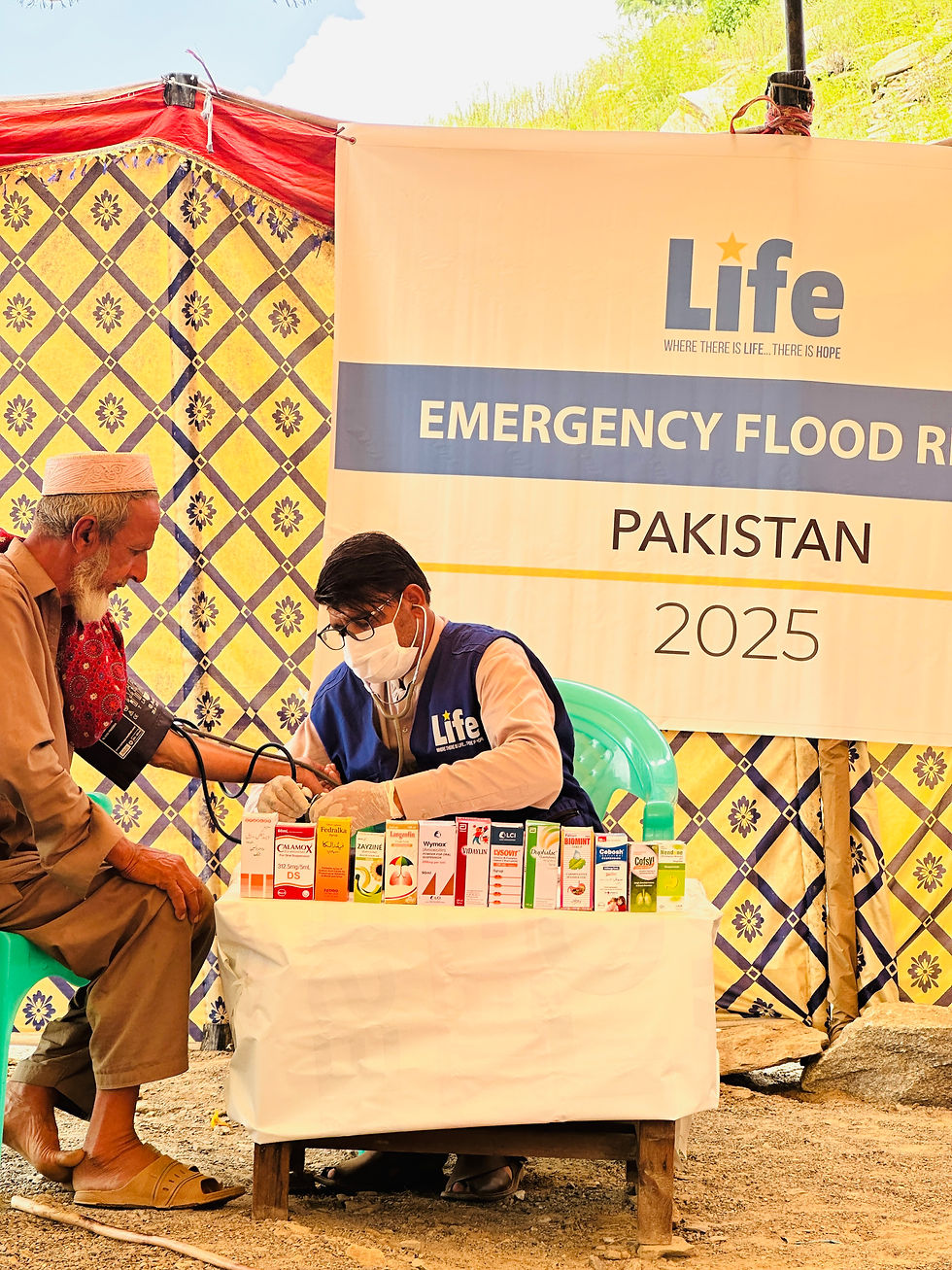 Photo of Life for Relief and Development USA (LIFE) team member performing