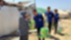 Photo of the Life for Relief and Development (LIFE) delivering diapers to a young mother in Gaza. 