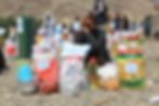 Photo of a man receiving food and essentials from the Life for Relief and Development USA (LIFE) team in Afghanistan.