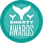 1200px-Shorty-badge_svg.webp