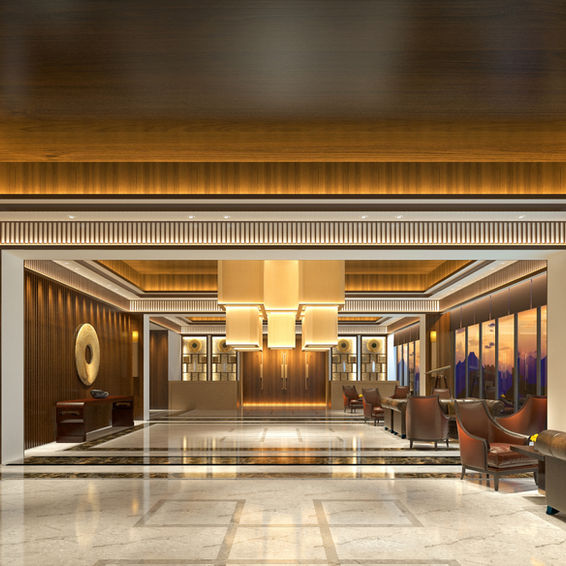 Luxuriöse Hotellobby mit warmen Holzakzenten, Marmorfußboden und eleganter Beleuchtung, die einladende Atmosphäre schafft. Hörl Lichttechnik ist für die maßgeschneiderte Lichtgestaltung verantwortlich, die den Raum stilvoll inszeniert.