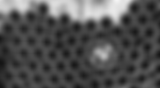 black and white photo of roll cores stacked on their sides