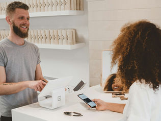 Freelance Shopify developer working on an e-commerce store on a laptop in 2026