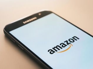 Content creator reviewing Amazon products for their influencer storefront in 2026