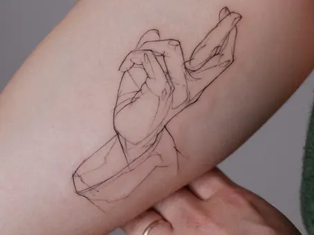 Fine line holding hands tattoo on forearm – minimalist sketch style black ink work depicting two hands interlocking