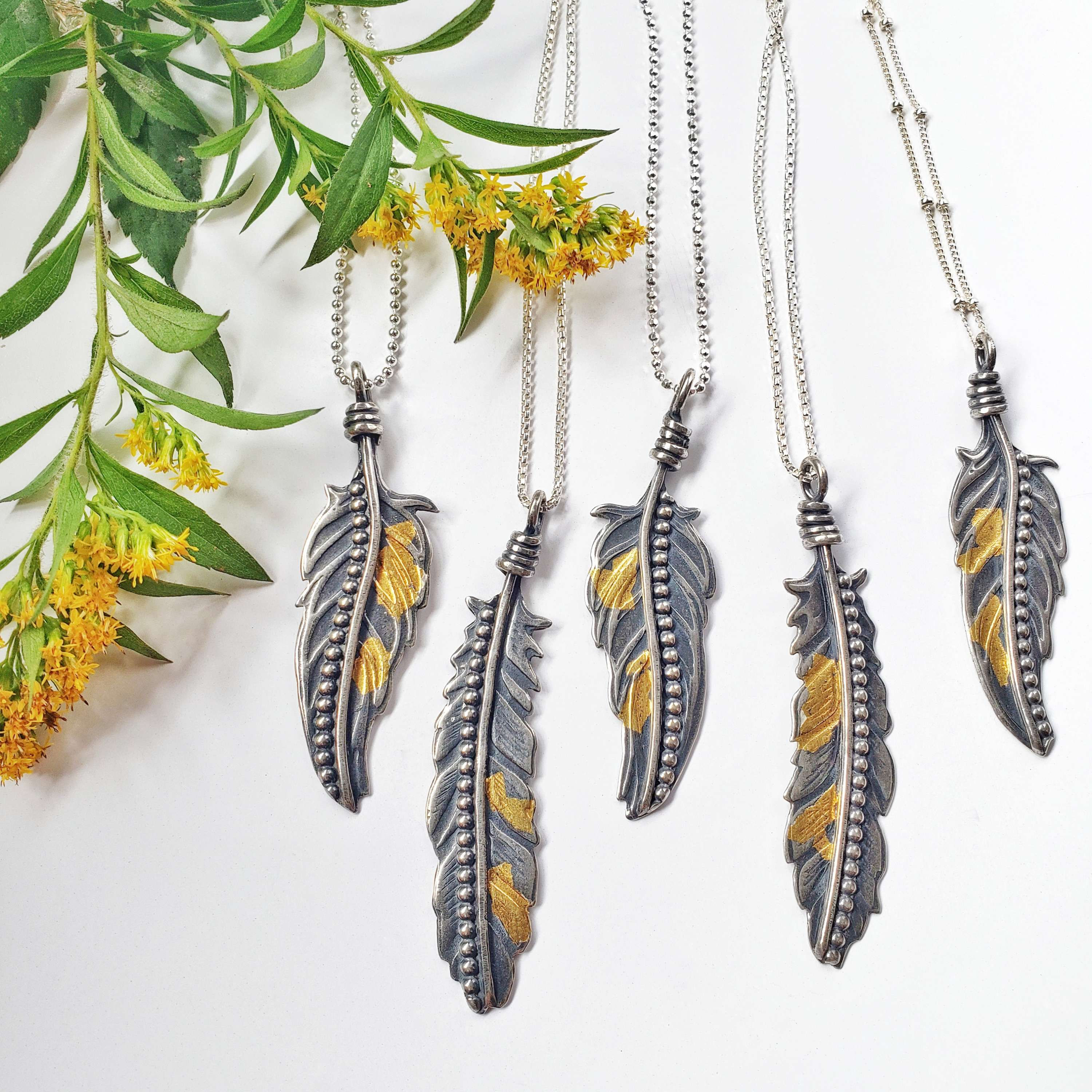 magic feathers w. 24k gold