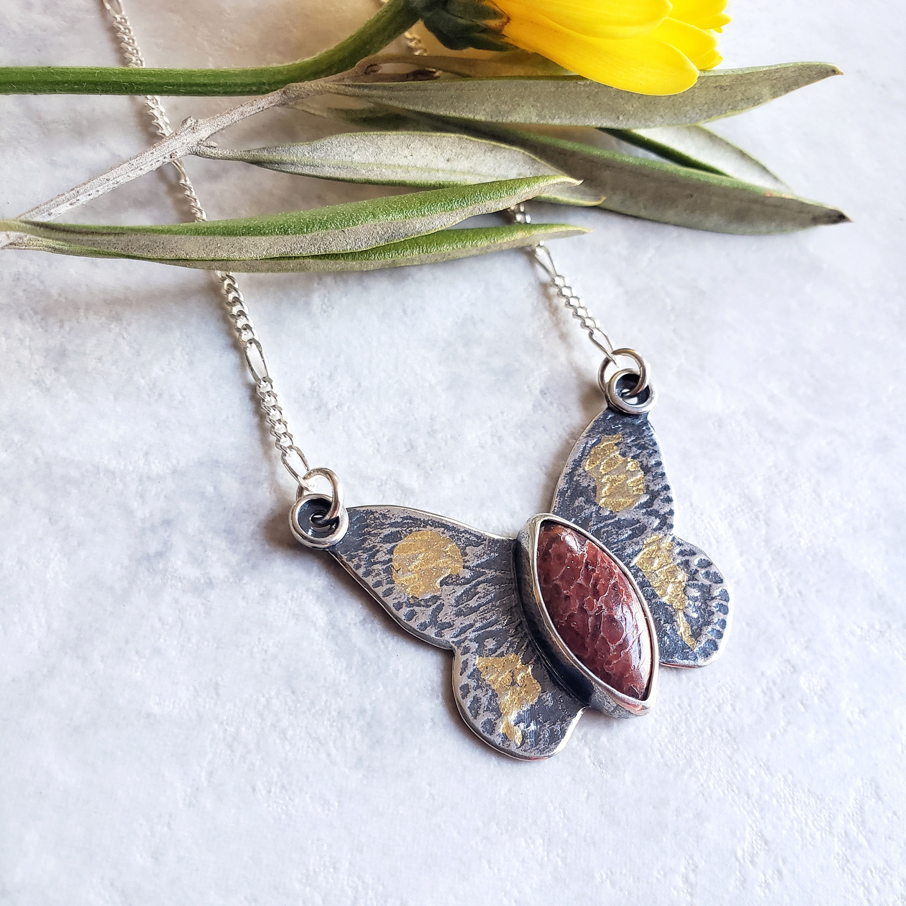 dinosaur bone butterfly: medium, cranberry