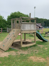 climbing frame and slide in nursery garden