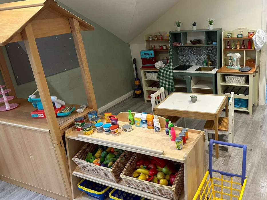 play kitchen with small table, play food and trolleys