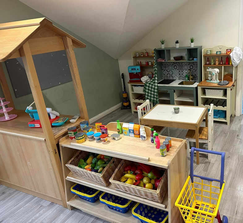 play kitchen with small table, play food and trolleys