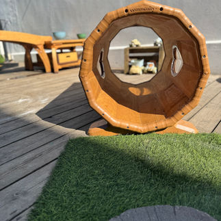 nursery garden with tube to crawl through