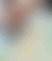 two children scooping and pouring oats