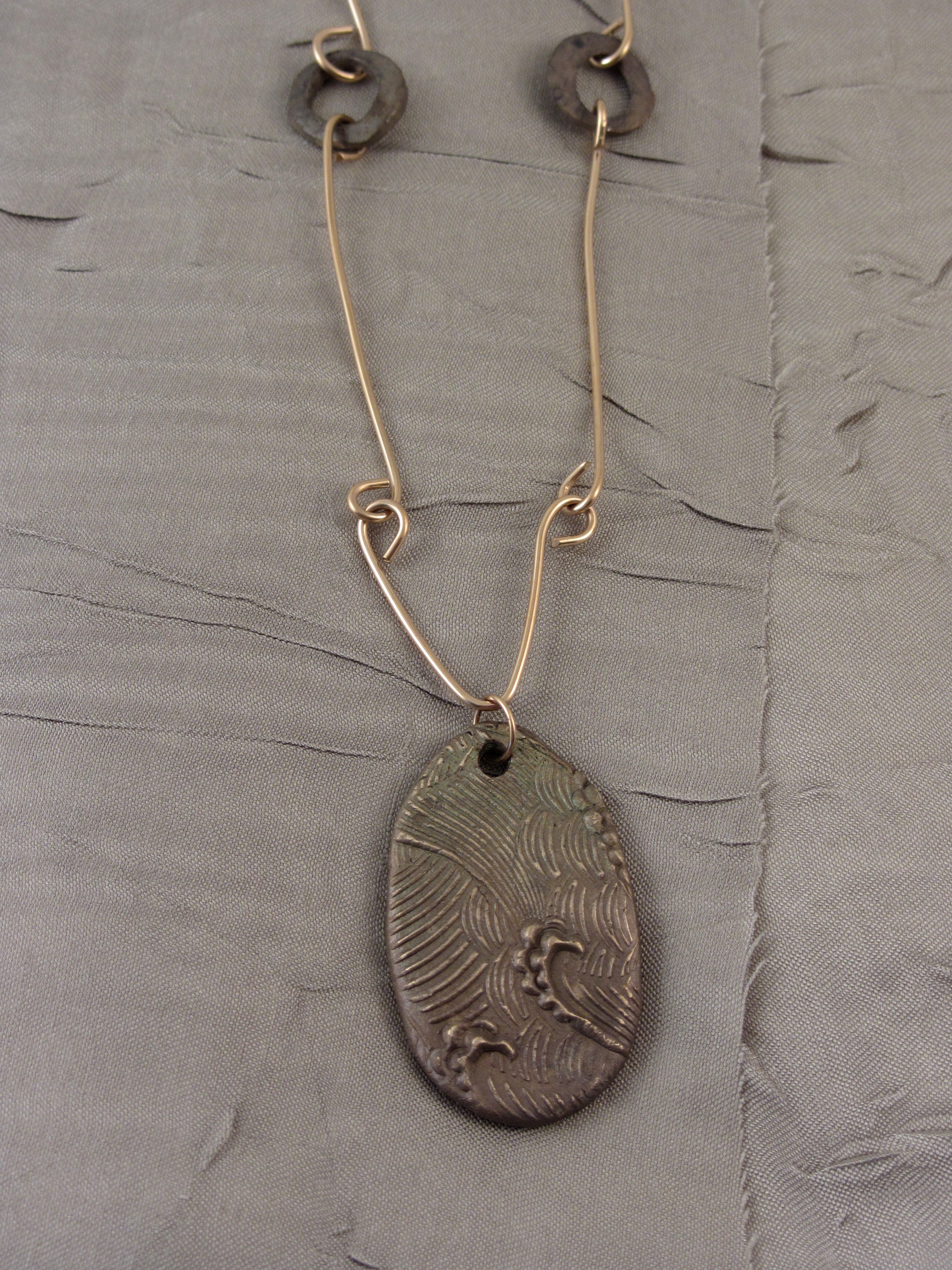 Bronze pendant