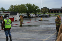 Jr. Firefighters training with hose