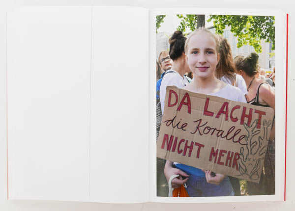 Wir sind hier, wir sind laut: Fridays for Future is a photo book by photographer Andrea Baumgartl on protest in Berlin published by Kerber Verlag, Bielefeld, Germany,2020
