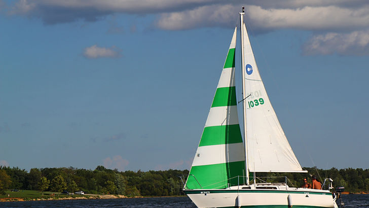 Sailboat with green stripes, number 1039