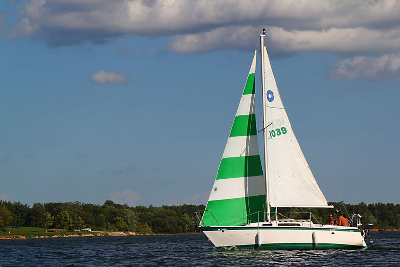 Sailboat with green stripes, number 1039