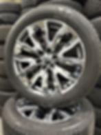 Thumbnail: OEM 22” GM Accessory Chrome & Gray Wheels w/ Bridgestone Alenza AS02 tires.