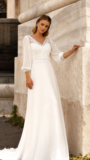 Robe de mariée romantique manches longues fluide