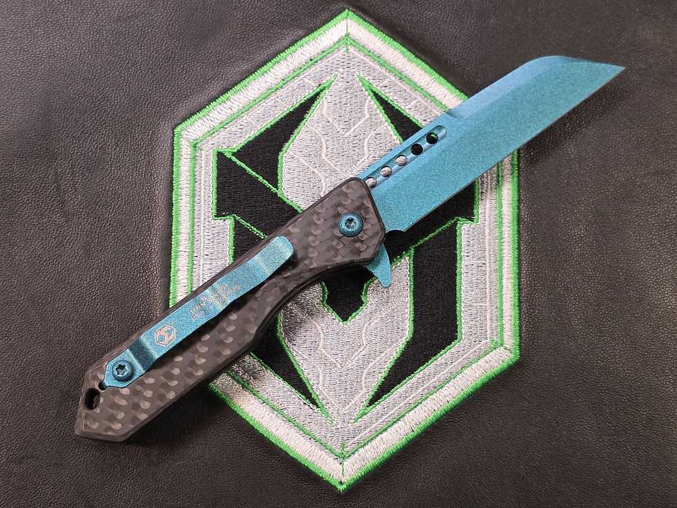 Heretic Knives Jinn Manual Metallic Teal MagnaCut Carbon Fiber H213-MT-CF