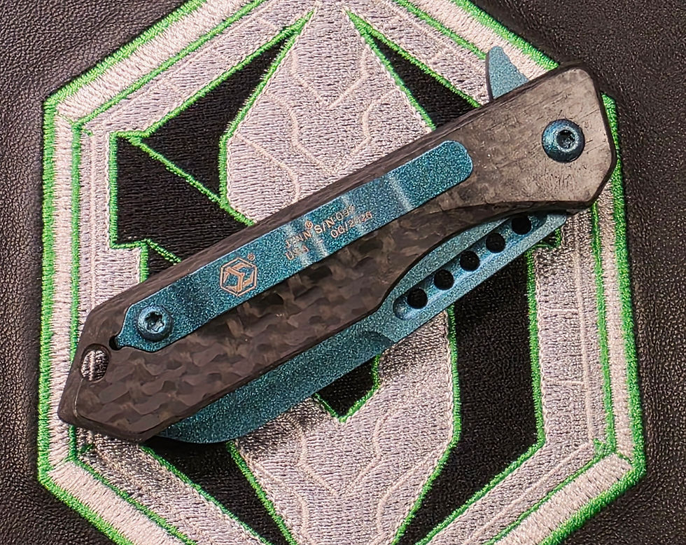 Thumbnail: Heretic Knives Jinn Manual Metallic Teal MagnaCut Carbon Fiber H213-MT-CF