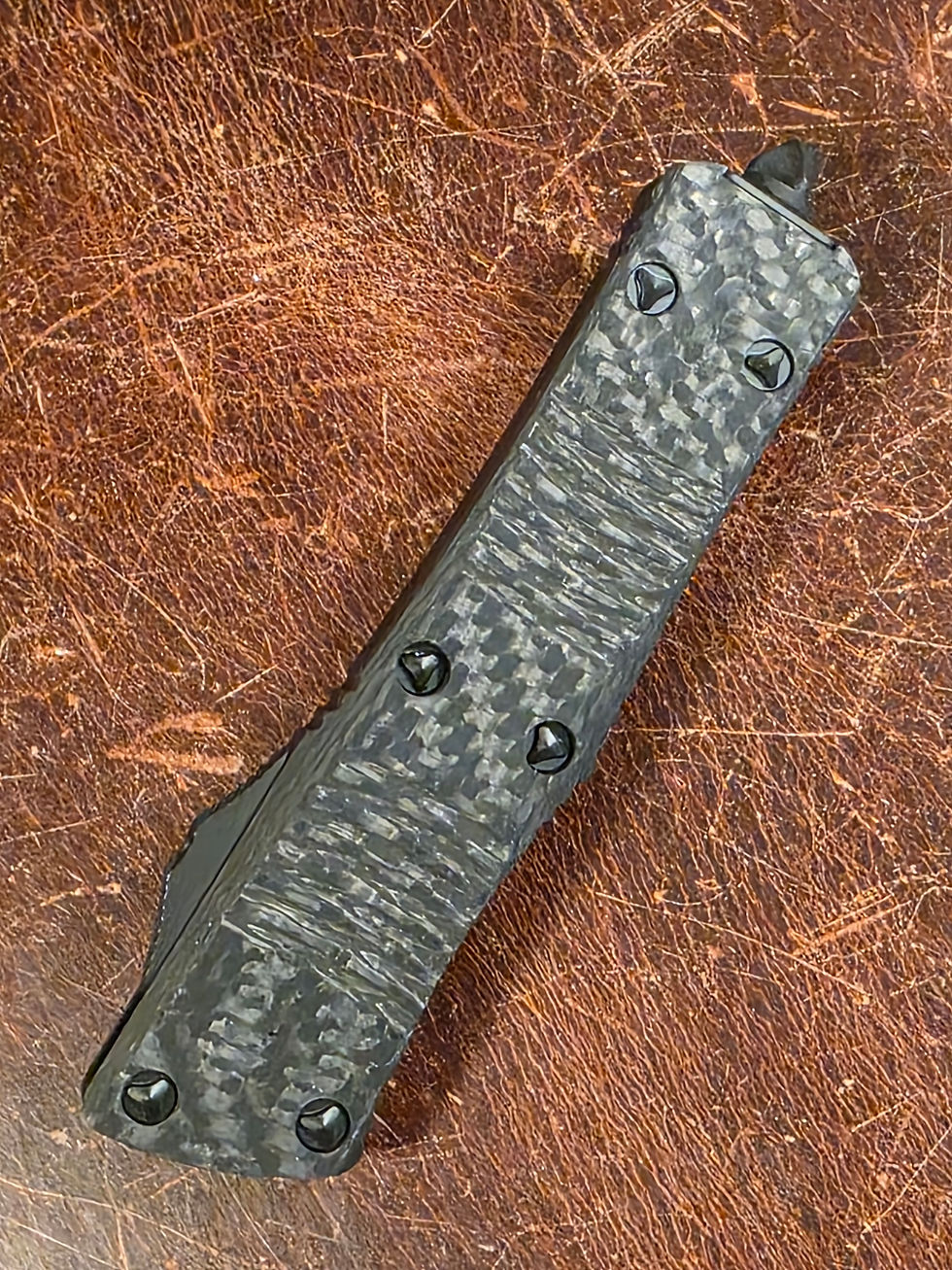 Thumbnail: Microtech Troodon OTF Knife- Double Edge- Carbon Fiber Top- Black Blade 138-1 CFS SN035
