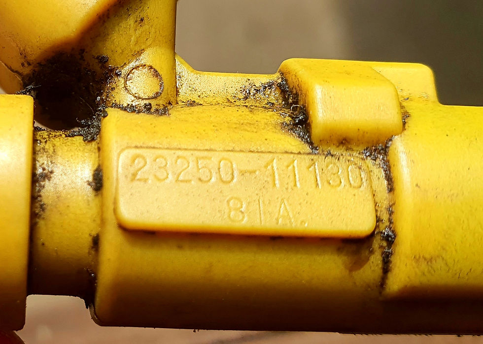 Miniatura: E10 E11 Corolla yellow fuel injector (1) 1.3 4e-fe 23250-11130