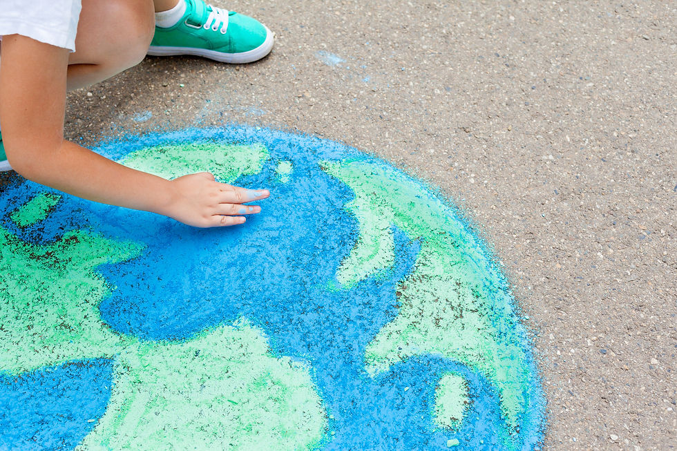 child drawing a globe.jpg