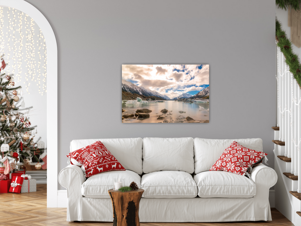 View of the Tasman Lake image placed behind a couch.