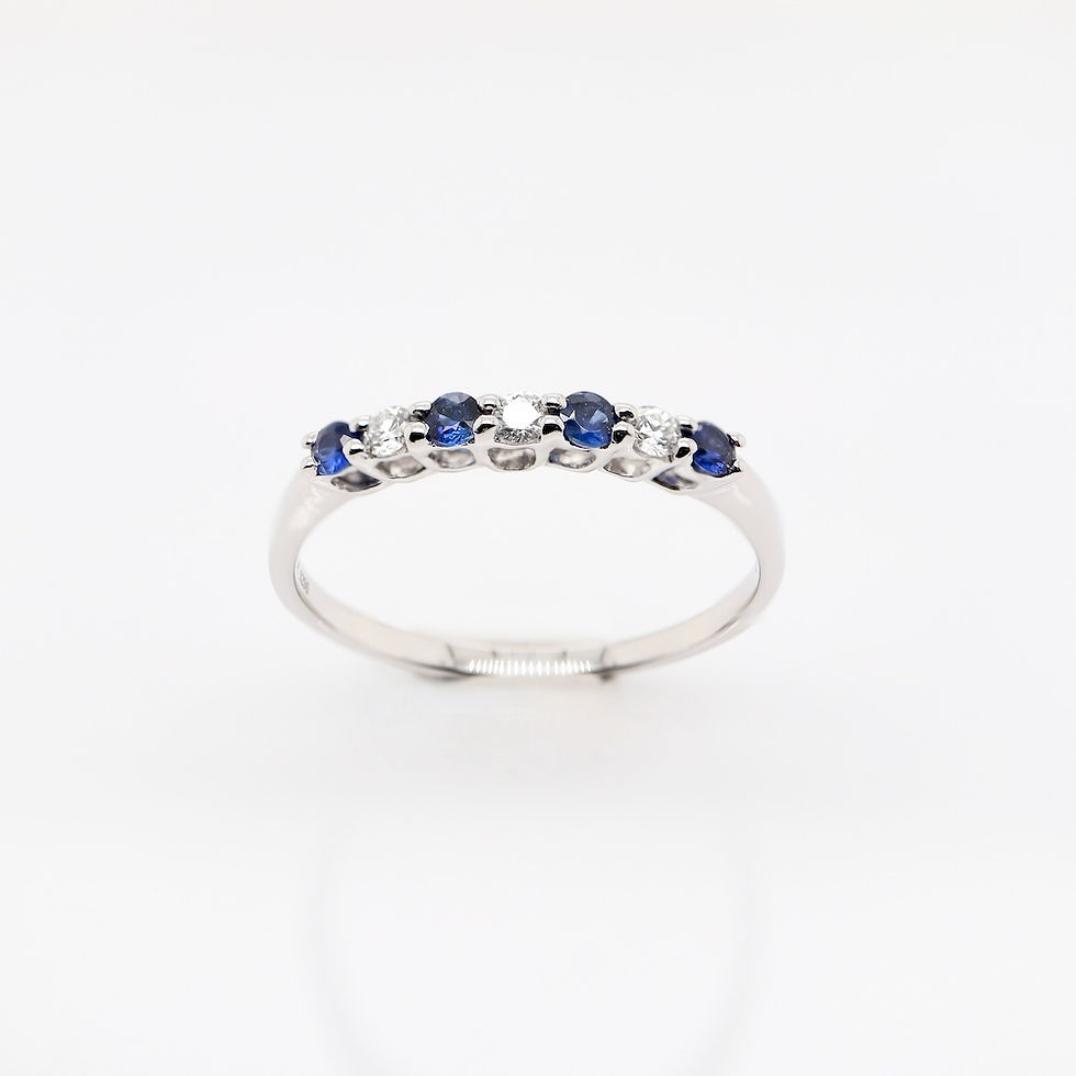Thumbnail: Classic seven-stone diamond ring, also available with alternating gemstones, in fine gold.