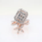 Asymmetrical floral and Art Deco diamond ring with illusion cluster and marquise flower details.