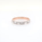 Geometric mixed-cut diamond ring band with baguette and round diamonds in fine gold.