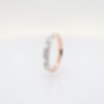 Geometric mixed-cut diamond ring band with baguette and round diamonds in fine gold.
