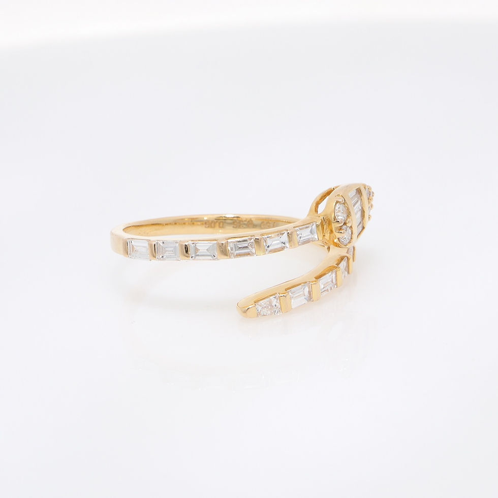 Thumbnail: Baguette diamond snake ring with a composite diamond head in a fine gold wrap design.