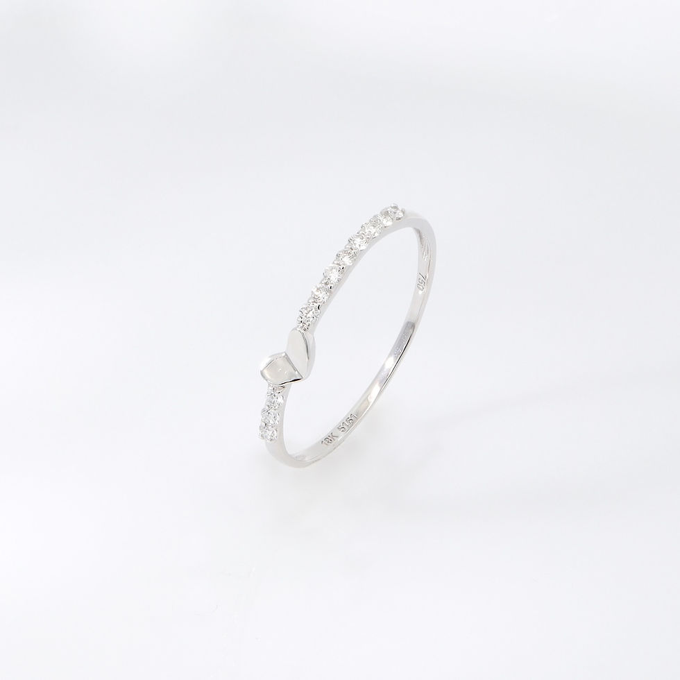 Thumbnail: Minimalist heart diamond ring with a polished gold heart on a pavé diamond band.