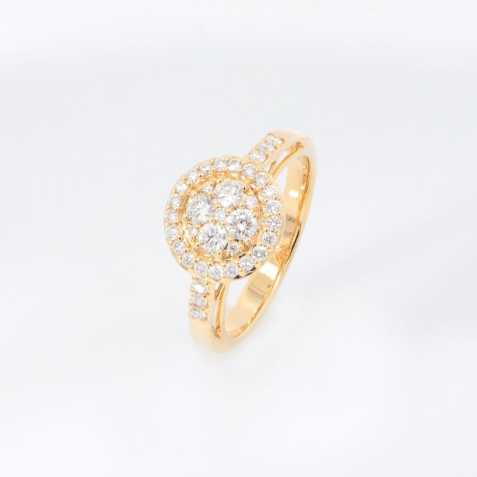 A gold halo diamond cluster ring with a pavé-set band, featuring brilliant diamonds.