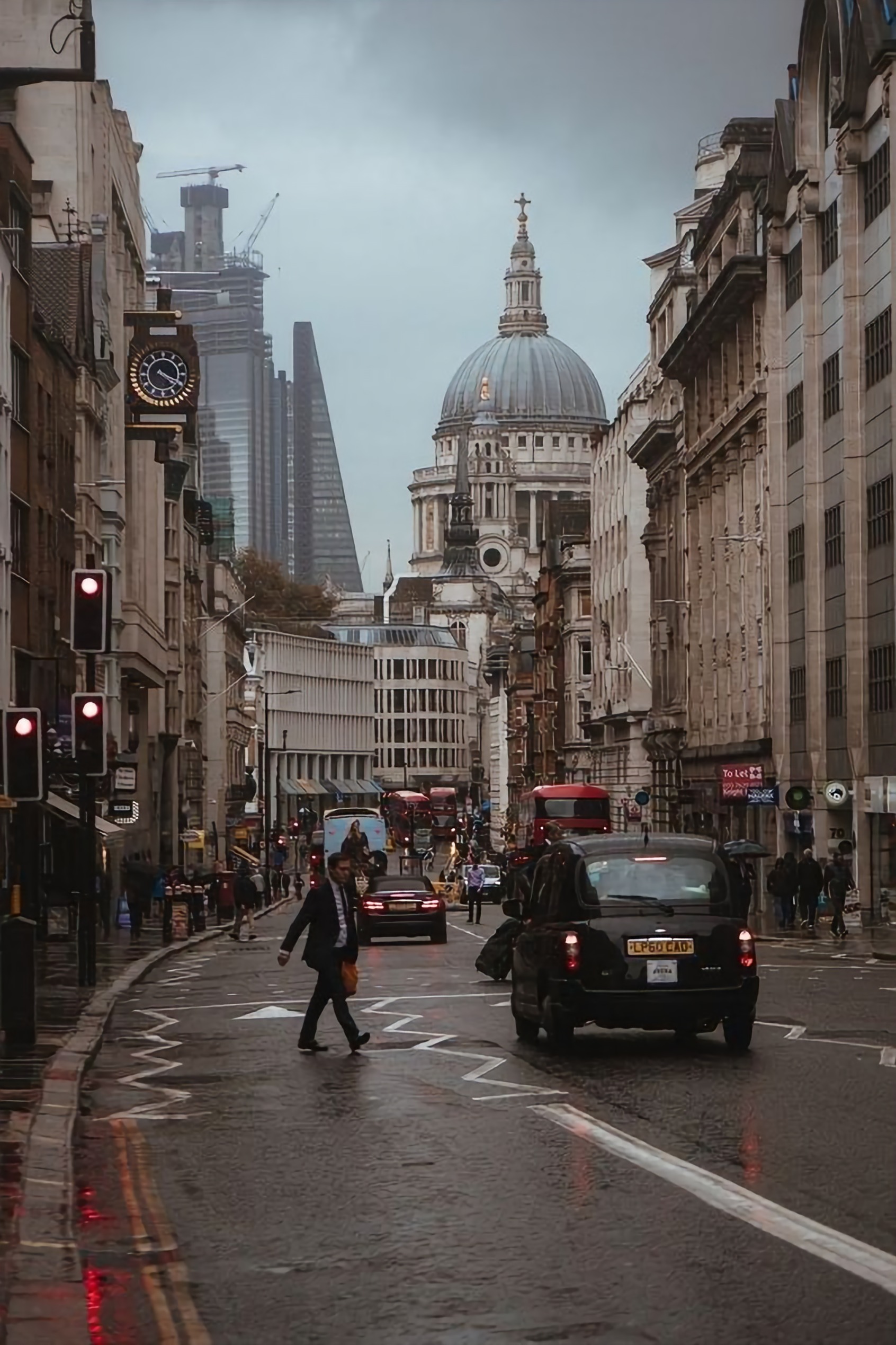 Looking down a City of London street towards St Paul's Cathedral