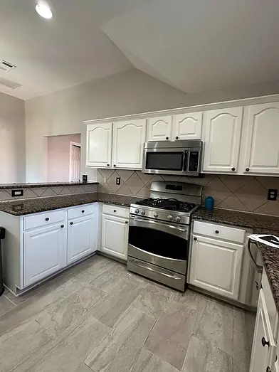 White kitchen cabinets before Kings Ridge Frisco TX kitchen remodeling project