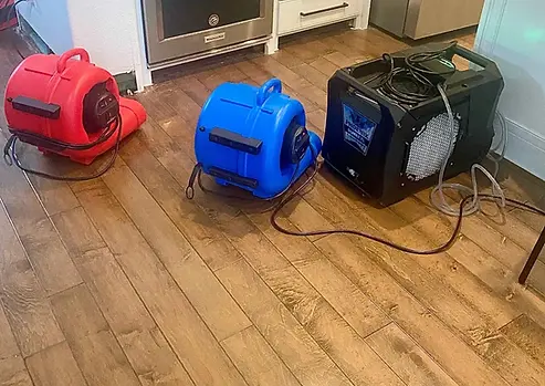 Professional drying equipment during a Lewisville TX water damage restoration project