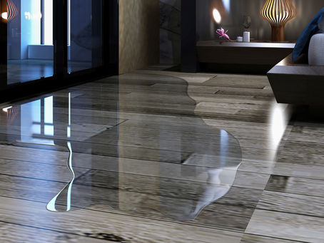 Frisco TX hardwood flooring water damage from leak, by Floors To Ceiling Restoration