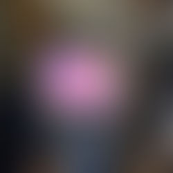 Technician using infrared camera to inspect moisture near flooring and staircase in Frisco home