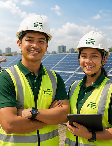 Two smiling Ventura Energy solar engineers at a solar farm.