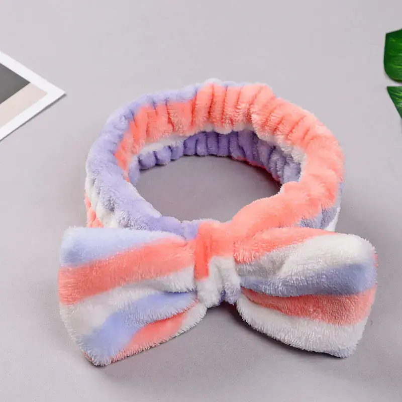 Thumbnail: Fleece striped bow headband for soft makeup and skincare routines