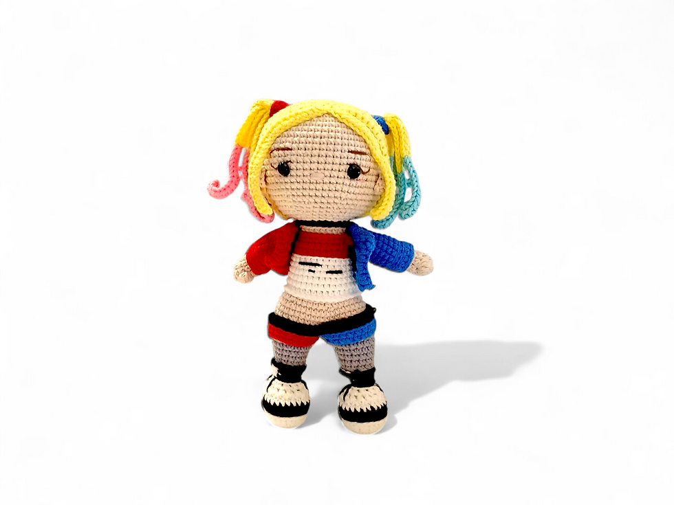 Front view of Harley Quinn in her classic red and blue outfit with blonde pigtails, holding a bat, cheeky smile, white backgr